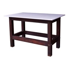 a wooden table with a white top