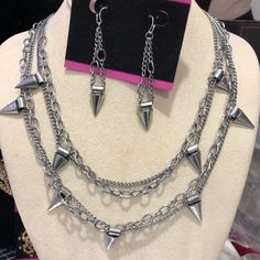 Let Your Rocker Moto Glam Side Shine With Some Tough Chick Chic Accessorizing!! Antiqued Metal Chains And Spikes Will Instantly Update A T-Shirt And Your Favorite Jeans. Free Gift Is Earrings 19” Chain 1” Adjustable Length Lobster Claw Closure Antique Silver Finish 44n -Box 7 Punk Style Dangle Chain Jewelry, Punk Style Silver Chain For Parties, Punk Dangle Jewelry With Adjustable Chain, Edgy Dangle Jewelry With Adjustable Chain, Edgy Silver Chain Jewelry For Party, Edgy Dangle Chain Jewelry, Edgy Nickel-free Jewelry For Parties, Dopamine Jewelry, Rockstar Jewelry