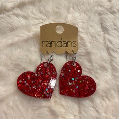 Randans is family owned and operated in Fort pierce , FL. All items are handcrafted! These earrings are the most lightweight and comfortable earrings you’ll ever wear. With over 100 styles and 200 colors, you’re sure to find something perfect for any occasion. What material are these made of? Randans are handmade with glitter and resin. The glitter is encased in resin and will not flake or peel off. The ear wires are stainless steel. Most people with metal sensitivities can wear stainless steel. Comfortable Earrings, Fort Pierce, Resin Glitter, Glitter Earrings, Glitter Hearts, Heart Studs, Red Glitter, White Heart, Ear Wires