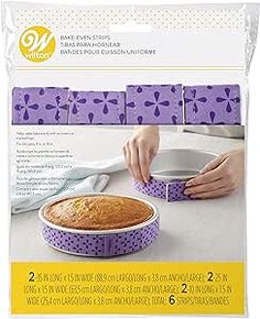 a package of cake pans with purple polka dots on the front and bottom, one being