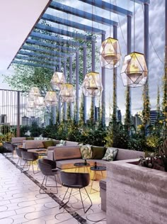 an outdoor seating area with hanging lights and plants