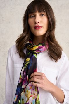 Our lightweight Noir Bloom Scarf is an homage to bright blooms. Crafted from 100% silk, this delicate and vibrant scarf features a black base with a multicoloured floral design. Style it with black for a fun pop of colour. Black Floral Print Scarf, Black Silk Scarf With Floral Print, Black Silk Scarves With Floral Print, Black Silk Scarf For Summer, Spring Multicolor Silk Scarf, Black Silk Scarf For Spring, Design Style, A Black, Childrens Clothes