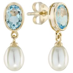 Step into timeless elegance with these vintage-inspired earrings, a captivating blend of classic elements and natural motifs. At the heart of each earring lies an oval-shaped blue topaz, nestled within a gold frame, radiating luxury and refinement. Connected by a small gold link, drop-shaped white pearls delicately dangle, infusing the design with a touch of sophistication and grace. These earrings would be a perfect accessory for formal events or as a statement piece for special occasions. CHAR Classic Blue Topaz Gemstone Earrings, Classic Blue Topaz Birthstone Earrings, Classic Gold Earrings With Blue Topaz, Oval Topaz Earrings For Formal Occasions, Oval Gold Topaz Earrings, Formal Oval Topaz Earrings, Classic Blue Topaz Yellow Gold Earrings, Classic Yellow Gold Blue Topaz Earrings, 14k Gold Oval Pearl Earrings