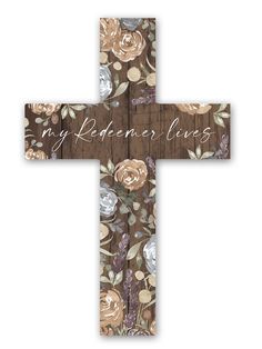 a wooden cross with flowers on it and the words my remembrance lives written in white