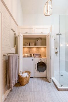 a washer and dryer in a small room