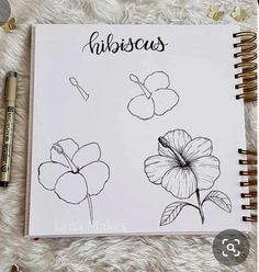 an open notebook with flowers drawn on it and the words fabulous written in black ink