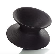 two black bowls stacked on top of each other