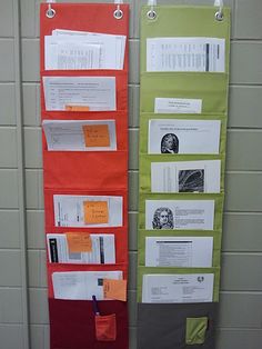 two bulletin boards with papers attached to them