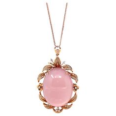 * DESIGN CONCEPT---18k Rose Gold & Natural Rose Quartz Pendant Necklace. This pendant made with high-quality genuine pink rose quartz. The rose quartz is striking yet elegant. Rose quartz represents the bananas between relationships. The design is a classic oval style. The rose quartz truly special, weighing in at almost 80 carats. And more than 100 diamonds surrounding the glamorous center stone make this neck-piece just that much more special. Every detail and Every angle are graceful. Every d Formal Pink Rose Quartz Jewelry, Luxury Pink Cabochon Jewelry, Formal Pink Cabochon Necklace, Luxury Oval Cabochon Necklace, Luxury Pink Oval Necklace, Elegant Pink Cabochon Necklace, Elegant Rose Quartz Jewelry For Formal Occasions, Pink Cabochon Jewelry For Formal Occasions, Rose Quartz Pendant Necklace