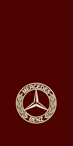 the mercedes benz logo is shown in gold on a maroon background with black and white lettering