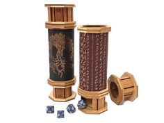 two wooden dice holders are next to each other and one is filled with dices