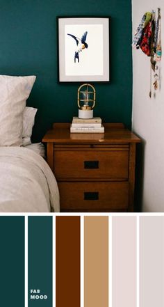 a bedroom with green walls and white bedding, two nightstands in the foreground