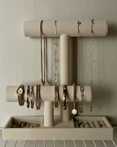 there is a shelf with jewelry on it