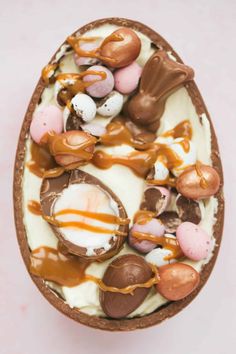 an easter egg covered in chocolate and marshmallows