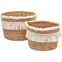 two woven baskets with tassels on the sides, one is brown and white