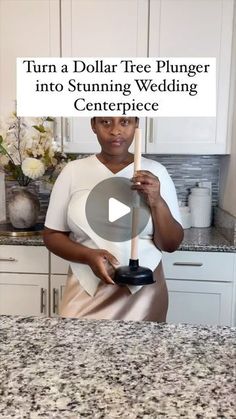 a woman standing in front of a counter holding an object with the words turn a dollar tree plunger into stunning wedding centerpiece