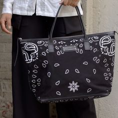 Fashionable and functional for your convenience, Jonny Cota's Black Bandana Tote can be carried on the shoulder, over the arm or in the hand. Alexander Mcqueen Scarf, Handles