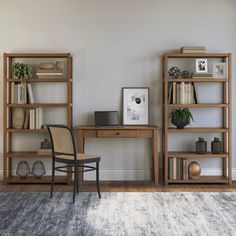 a chair sitting in front of a desk with bookshelves on top of it