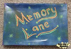 a blue plastic bag with the words memory lane written in orange and green on it