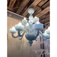 a blue chandelier hanging from the ceiling