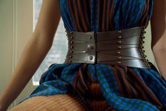 As always, we had to offer one of Úna’s fabulous corsets this Fall. The Three-Point Laced Cinch Belt is intricate, with its layers of leather and brass hardware, but is also utterly wearable. We love how it cinches in the waist, thus enhancing the natural female form. It is adjustable and looks fabulous on every body type. Product Details: * Italian Vegetable Tanned Leather * Solid Brass Fittings. * Adjustable * Handmade in Ireland Luxury Corset Belt, Luxury Fitted Corset Belt, Modern Fitted Corset Belt For Party, Vintage Fitted Corset Belt, Vintage Fitted Belted Corset Belt, Luxury Corset Belt For Evening, Modern Fitted Corset Belt With Belt Loops, Designer Fitted Belts For Party, Luxury Corset Belt For Party