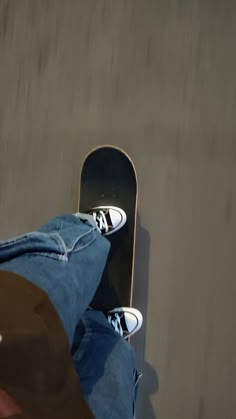 a person riding a skateboard down the side of a ramp