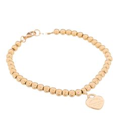 This is an authentic TIFFANY 18K Rose Gold 4mm Return To Tiffany Bead Heart Tag Bracelet. The bracelet is crafted of 18-karat rose gold and features polished 4mm beads and a heart charm accented with the signature 'Return to Tiffany' engravings. Tiffany Gold Bracelet, Braclets Gold, Tiffany Gold, Tiffany Bracelet, Bead Heart, Return To Tiffany, Heart Tag, Tiffany And Co, Heart Of Gold