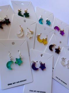 Moon and star shaped earrings made out of epoxy resin hypoallergenic findings. All sets are lovingly handmade and come with soft, clear earring backings. Resin Earring Ideas, Resina Epoxi Ideas, Diy Resin Earrings, Epoxy Resin Earrings, Space Earrings, Sweet Like Honey, Epoxy Resin Jewelry, Clear Earrings, Moon And Star Earrings