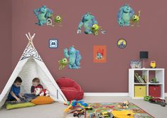 children's playroom with teepee tent and monsters wall decals