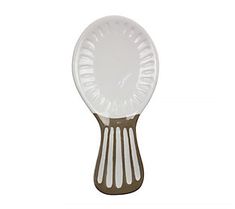 a white and brown plastic spoon on a white background