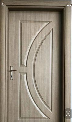 an image of a door that is made out of wood and has the letter d on it