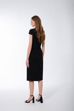 This dress features an A-line silhouette and cap-sleeved design, perfect for a stylish, yet professional look. Its midi length offers a flattering silhouette and is sure to be a timeless addition to any wardrobe. Sleek A-line Midi Dress With Flattering Silhouette, Black H-line Midi Dress For Formal Occasions, Structured A-line Midi Dress For Work, Classic H-line Midi Dress For Work, Black H-line Midi Dress For Work, Sleek H-line Workwear Dresses, A-line Midi Dress With Flattering Silhouette For Work, Evening Midi Dress With Flattering Silhouette And Short Sleeves, Short Sleeve Midi Dress With Flattering Silhouette For Evening