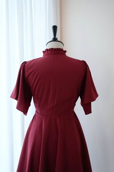 Fitted Solid Color Cocktail Dress, Solid Color Short Sleeve Party Dress, Fitted Dress With Back Zipper, Formal Fitted Vintage Dress, Elegant Fitted Vintage Dress In Solid Color, Elegant Solid Color Fitted Vintage Dress, Short Sleeve Lined Midi Dress For Party, Vintage Short Sleeve Dress With Ruffles For Party, Chic Short Sleeve Vintage Party Dress