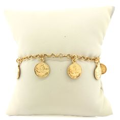 This YGP Sterling 8 Coin Bracelet has been constructed with yellow gold plated sterling silver and features eight 10mm 5 lire coins. Measuring 7.5" in length and weighing 4.75dwt, the bracelet features a lobster clasp closure.Chain Type:CableClosure:LobsterColor:Gold.Main Stone:No StoneSecond Stone:No StoneCustomized:NoHandmade:NoSigned:NoSizable:NoVintage:NoAntique:NoFeatures:StackableShape:OvalLength:7.5 InchesGender:Women Gold Coin Bracelet For Women, Coins Bracelet Gold, Vintage Silver Coin Bracelets, Gold Coin Bracelet, Vintage Silver Coin Bracelet, Chinese Coin Bracelet, Coin Bracelet, Summer 24, Gold Coins