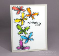 a handmade birthday card with colorful flowers on the front and bottom, which reads happy birthday wishes