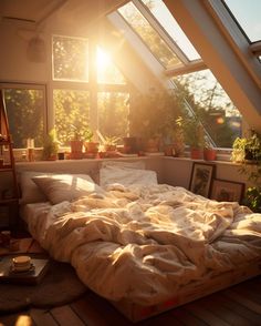 an unmade bed sitting under a window in a room filled with potted plants