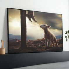 a sheep standing next to a tree on top of a shelf in front of a painting