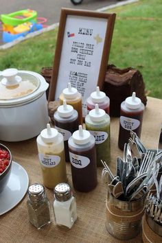 there are many different condiments on the table