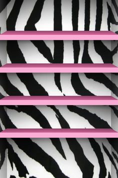 a zebra print window covering with pink trim