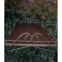 a wooden and metal table with two circles on it