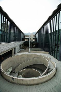 a circular building with multiple levels and windows