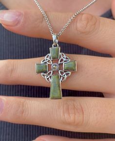 A true piece of Ireland. This is a lovely Celtic cross necklace is made with sterling silver, connemara marble and marcasite stones. A lovely combination! At the centre of the cross pendant is the marcasite and Connemara marble panels are set around it to make this Celtic cross one of a kind.  This beautiful stone originates from ancient quarries to be found in the area of Connemara in County Galway in the west of Ireland. Celebrated for its forty shades of green, Connemara marble evokes the ric Connemara Marble Jewelry, Stone Cross, Cross Necklace Vintage, Celtic Cross Necklace, Vintage Cross Necklace, Marble Jewelry, Celtic Necklace, Irish Jewelry, Celtic Cross