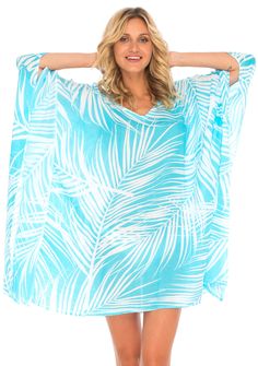 Having a stylish beach cover up is a must! The beautifully printed tunic beach coverup creates a vibrant look. Easy to pull on and easy to pack. Making clothes for the traveling woman. Boho design Lightweight beach dress Semi-Sheer Hand wash in cold water, hang to dry Blue Flowy Breezy Cover-up, Blue Breezy Flowy Cover-up, Beachy Printed Pool Cover-up, Tropical Long Sleeve Cover-up For Beach Season, Blue Flowy Cover-up For Beach Season, Blue Summer Cover-up With Upf 50+, Printed Beachy Pool Cover-up, Blue Long Sleeve Swimwear For Beach Cover-up, Tropical Printed Cover-up For Resort Season