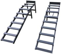 a set of black metal steps on white background