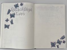 an open notebook with blue butterflies and the words matchage tips written in black ink