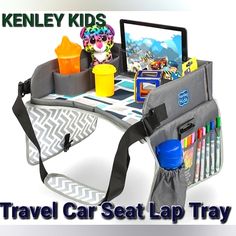 the travel car seat lap tray is packed with markers, crayons and pencils