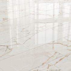 a white marble floor that is very shiny