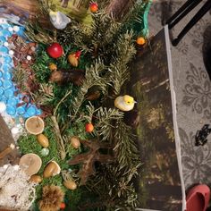 an arrangement of fake trees and other items