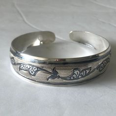 Vintage Russian 875 Silver Niello Pierced Wide Cuff Open Bangle Bracelet Authentic Guaranteed Russian Bracelet Hallmarked "875", ".95k" As Well As Star, Sickle & Hammer. A Wonderful Old Piece Decorated With Pierced Openwork, Intricate Etching And Fascinating Niello Enameling. The Bracelet Is Approx. 6/8” (15mm) In Its Widest , 7" Long. Great Vintage Condition! The Bracelet Will Fit Loosely The Wrist Of 7-8 Inches Or 18cm Please, Enlarge Pictures To See Details. You Will Get A Bracelet That You S Russian Jewelry, Open Bangle Bracelet, Custom Gift Boxes, Open Bangle, Wide Cuff, Bangle Bracelet, Womens Jewelry Bracelets, Etching, Bangle Bracelets