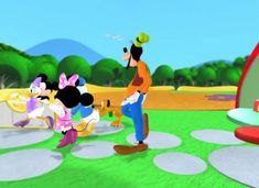 mickey mouse and friends are playing in the park